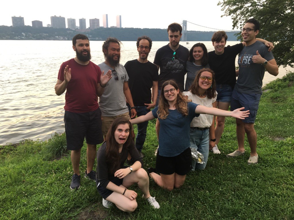 Entire group in front of the Hudson river and the GW bridge at Riverside Park making silly faces.